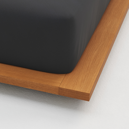 Close-up of a wooden frame corner on a white background